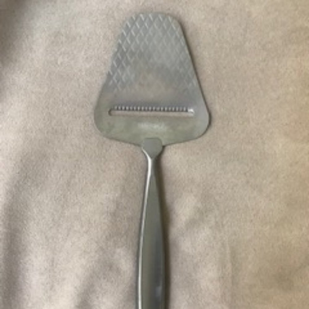BRAND NEW SILVER BOSKA CHEESE SLICER
